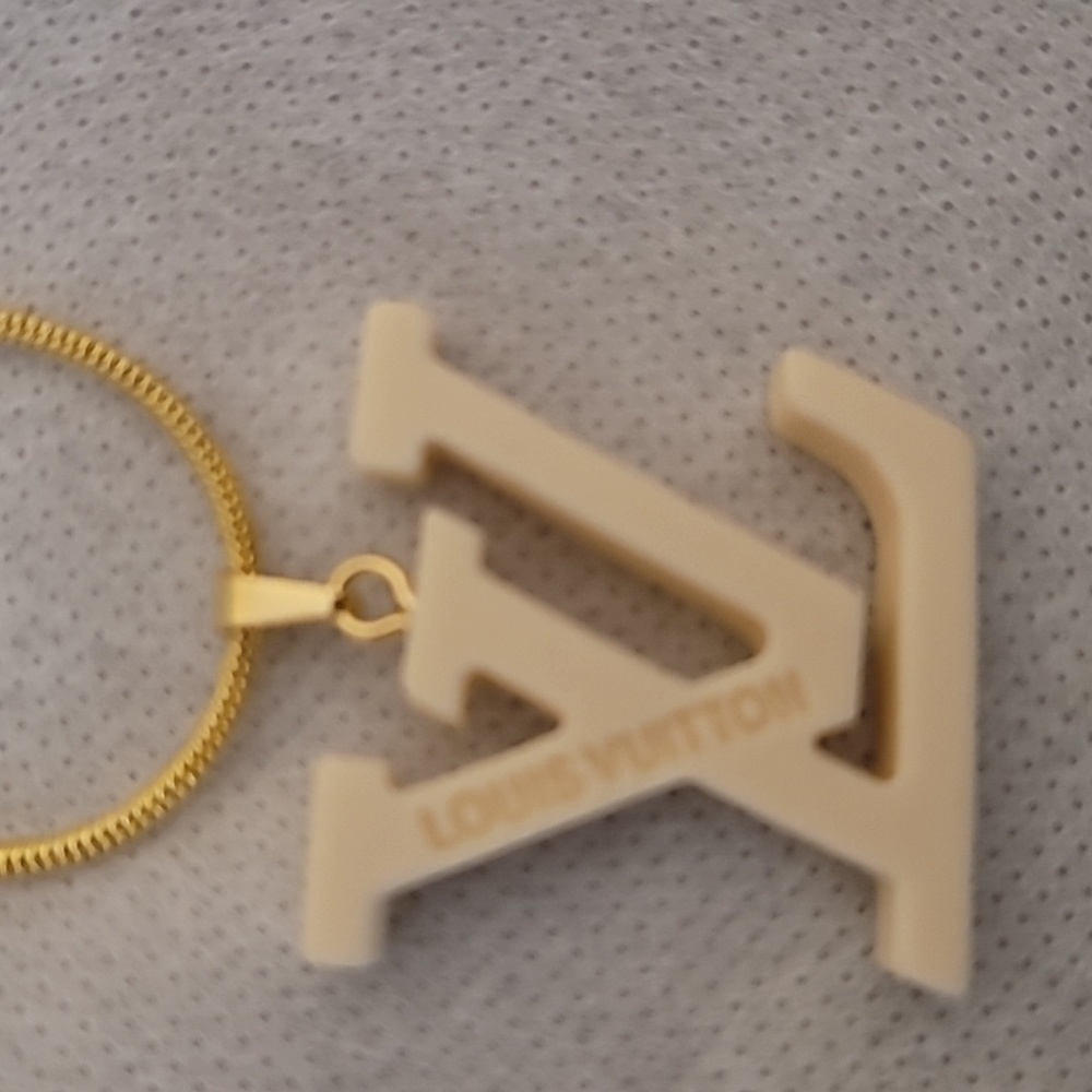 Louis Vuitton zipper pull necklace